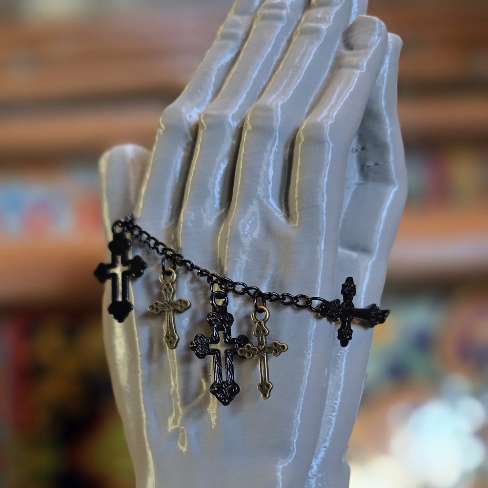 Elegant Black and Gold Cross Bracelet